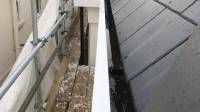 Concealed gutters lined and capped with aluminium pressed on site